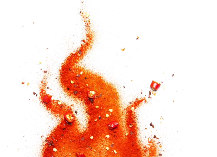 Spice dust and pepper slices in the shape of a flame