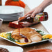 Raspberry Chipotle Sauce being poured over turkey