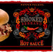 Smoked Serrano Hot Sauce on a pulled pork sandwich